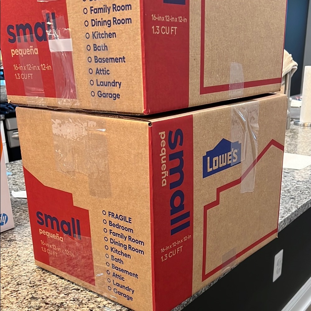 Red and White Cardboard Shipping Boxes for Office Supplies